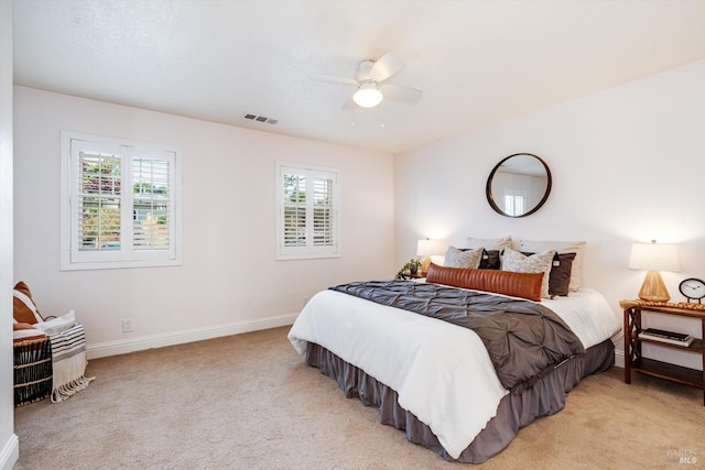 632 E K St, Benicia, CA 94510 - bedroom featuring light colored carpet, baseboards, and a ceiling fan