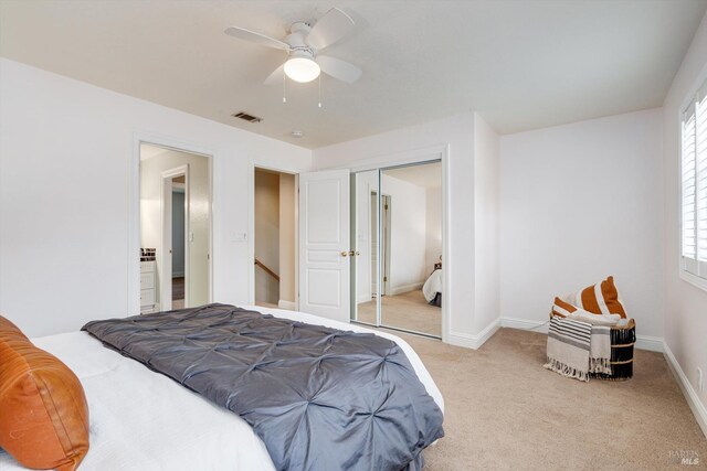 632 E K St, Benicia, CA 94510 - bedroom with light carpet, a closet, baseboards, and ceiling fan