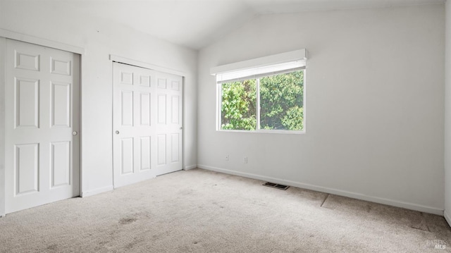 1191 Araquipa Ct, Vacaville, CA 95687 - unfurnished bedroom featuring carpet flooring, vaulted ceiling, baseboards, and a closet