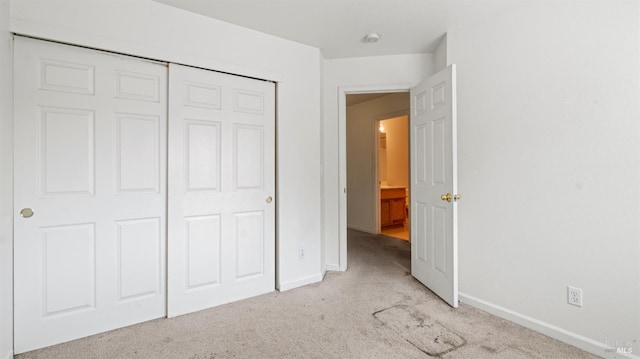 1191 Araquipa Ct, Vacaville, CA 95687 - unfurnished bedroom featuring light carpet, baseboards, and a closet