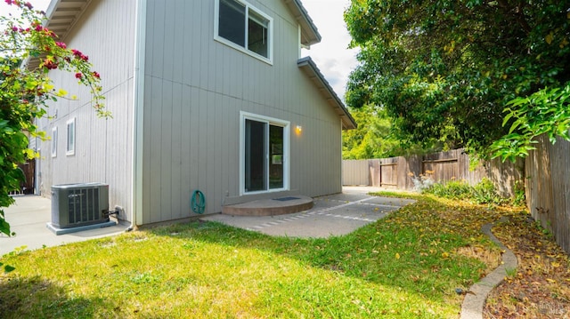 1191 Araquipa Ct, Vacaville, CA 95687 - back of property with central AC unit and a patio