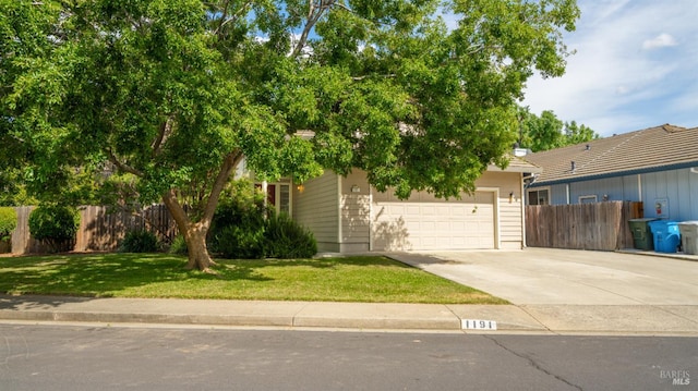 1191 Araquipa Ct, Vacaville, CA 95687 - view of property hidden behind natural elements featuring concrete driveway and a garage