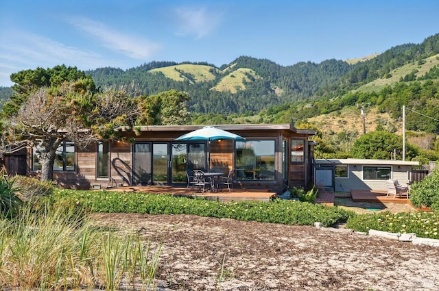 8 Rafael Patio, Stinson Beach, CA 94970 - back of property featuring a forest view, a mountain view, and a patio