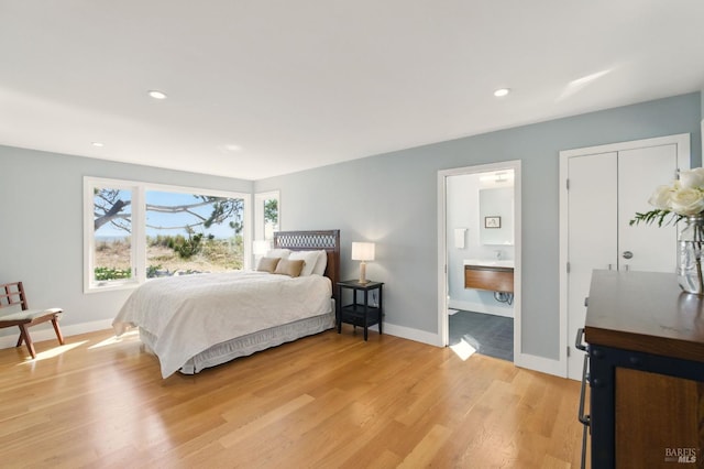 8 Rafael Patio, Stinson Beach, CA 94970 - bedroom featuring light wood-style floors, baseboards, recessed lighting, and ensuite bathroom