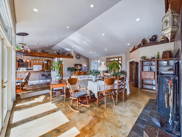 7785 Torgersen Rd, Eureka, CA 95503 - dining space featuring vaulted ceiling, a high end fireplace, recessed lighting, and finished concrete floors