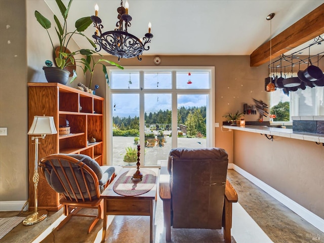 7785 Torgersen Rd, Eureka, CA 95503 - dining room featuring plenty of natural light, baseboards, and a chandelier