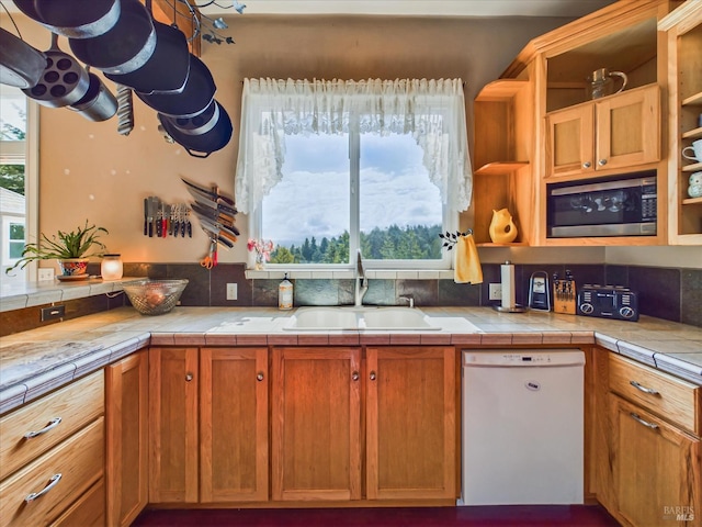 7785 Torgersen Rd, Eureka, CA 95503 - kitchen featuring dishwasher, a sink, stainless steel microwave, open shelves, and tile countertops