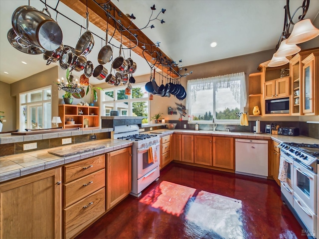 7785 Torgersen Rd, Eureka, CA 95503 - kitchen with appliances with stainless steel finishes, open shelves, a sink, concrete floors, and recessed lighting