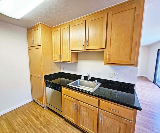 900 Cambridge Dr Unit 122, Benicia, CA 94510 - kitchen featuring dishwasher, a sink, light wood-type flooring, and baseboards