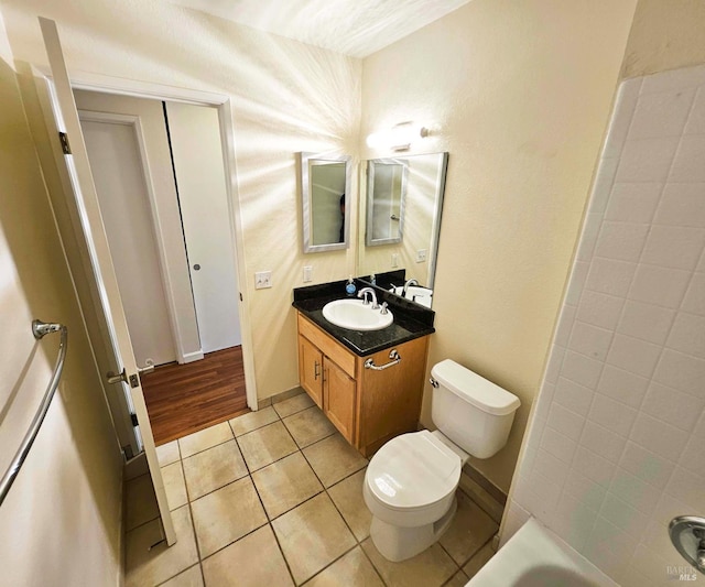 900 Cambridge Dr Unit 122, Benicia, CA 94510 - bathroom with toilet, tile patterned floors, and vanity