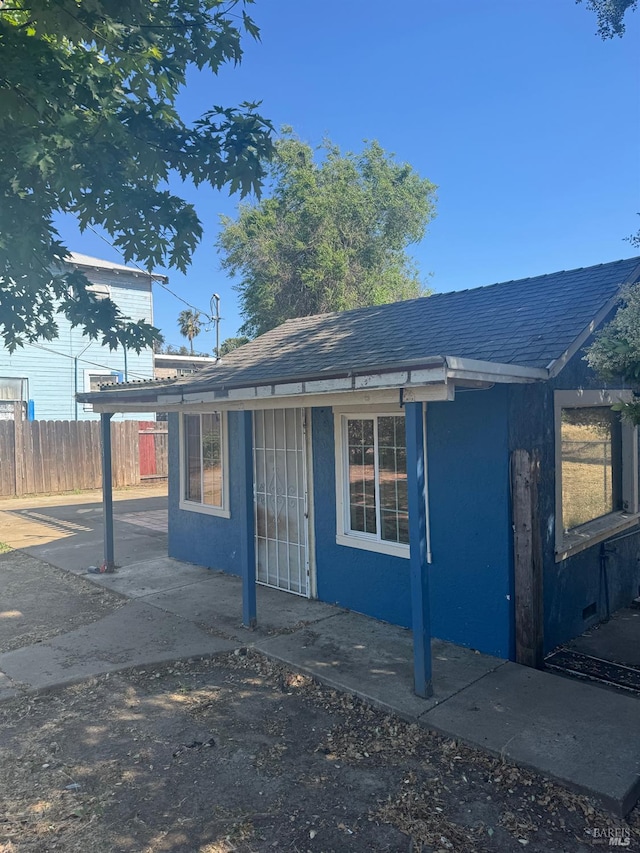 153 Idora Ave, Vallejo, CA 94591 - view of front facade featuring a shingled roof and stucco siding