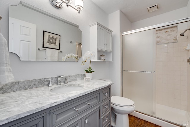 12 Maidu Ct, Napa, CA 94558 - bathroom with a shower stall, toilet, vanity, and wood finished floors