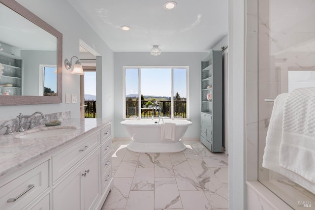 12 Maidu Ct, Napa, CA 94558 - bathroom with vanity, a freestanding bath, marble finish flooring, and recessed lighting