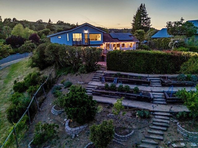 12 Maidu Ct, Napa, CA 94558 - back of house with stairs and solar panels