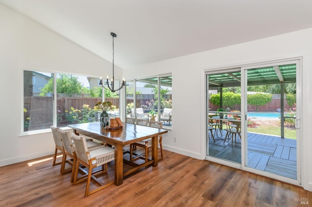 914 Cottonwood Ct, Petaluma, CA 94954 - dining area featuring a chandelier, lofted ceiling, baseboards, and wood finished floors