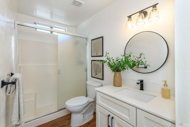 914 Cottonwood Ct, Petaluma, CA 94954 - full bathroom with vanity, a shower stall, toilet, and wood finished floors
