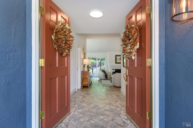 914 Cottonwood Ct, Petaluma, CA 94954 - entrance foyer with a fireplace, baseboards, and a textured wall