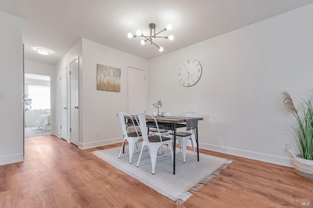 64 Los Padres Cir, Novato, CA 94947 - dining space featuring light wood finished floors, a chandelier, and baseboards