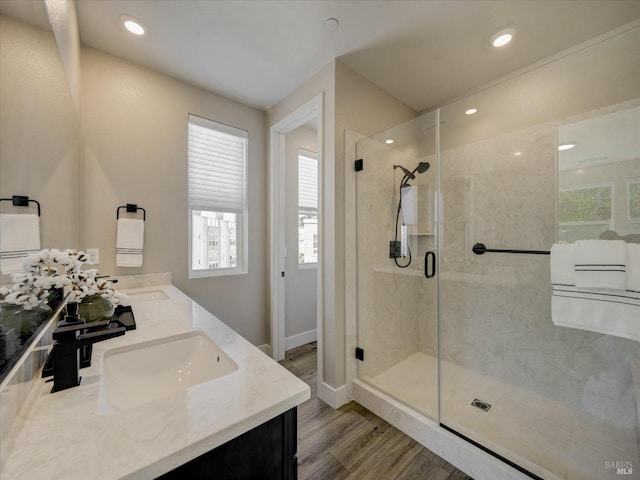 226 Verandah Ave, Novato, CA 94945 - full bathroom featuring wood finished floors, a stall shower, double vanity, baseboards, and recessed lighting