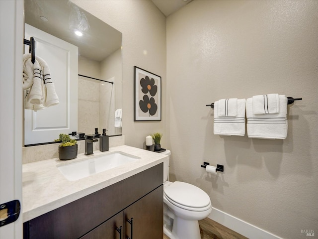 226 Verandah Ave, Novato, CA 94945 - full bath featuring toilet, vanity, wood finished floors, a shower, and baseboards
