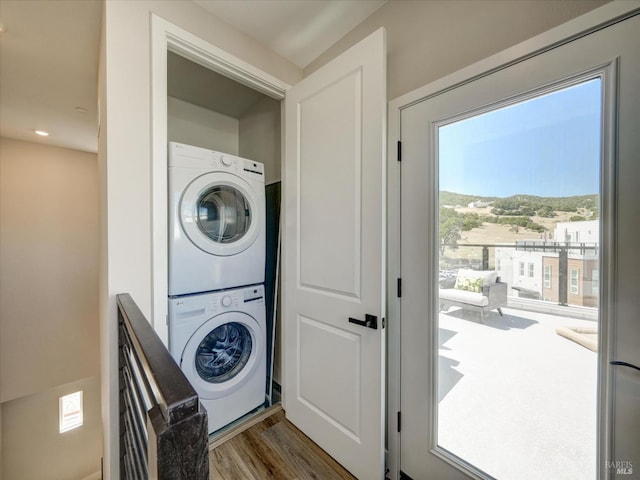 226 Verandah Ave, Novato, CA 94945 - laundry area featuring stacked washer and clothes dryer and wood finished floors