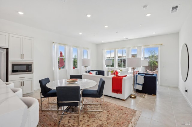 1749 Guadalupe St, Petaluma, CA 94952 - dining room featuring recessed lighting, light tile patterned flooring, and baseboards