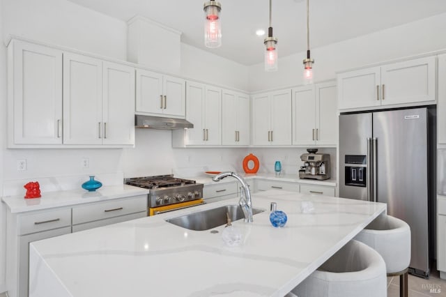 1749 Guadalupe St, Petaluma, CA 94952 - kitchen featuring a sink, stove, stainless steel fridge, under cabinet range hood, and a kitchen breakfast bar