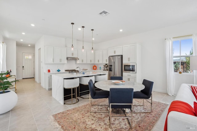 1749 Guadalupe St, Petaluma, CA 94952 - dining room featuring recessed lighting, light tile patterned flooring, and baseboards