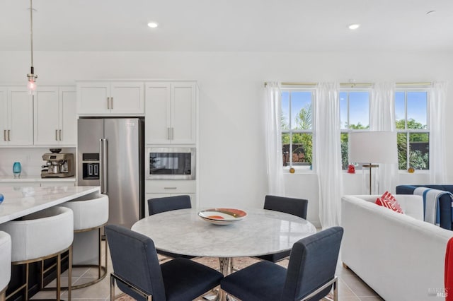 1749 Guadalupe St, Petaluma, CA 94952 - dining space with healthy amount of natural light, light tile patterned floors, and recessed lighting