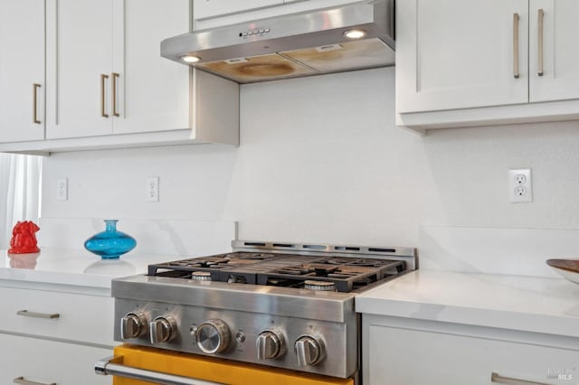 1749 Guadalupe St, Petaluma, CA 94952 - kitchen featuring extractor fan, white cabinetry, and stove
