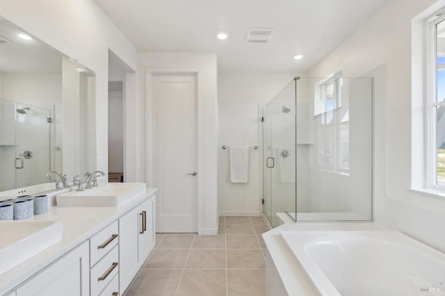 1749 Guadalupe St, Petaluma, CA 94952 - bathroom featuring a shower stall, a garden tub, double vanity, and tile patterned flooring