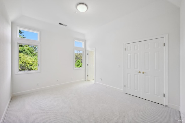 110 Monterey Dr, Tiburon, CA 94920 - unfurnished bedroom featuring multiple windows, baseboards, and light colored carpet