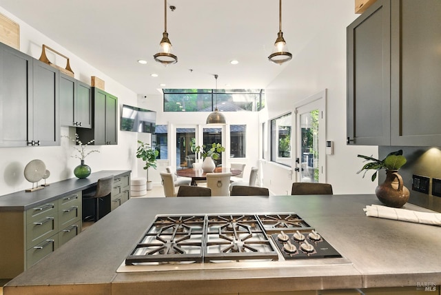 119 Marguerite Ave, Mill Valley, CA 94941 - kitchen featuring stainless steel gas cooktop, decorative light fixtures, recessed lighting, and a towering ceiling