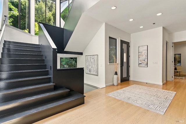 119 Marguerite Ave, Mill Valley, CA 94941 - staircase featuring plenty of natural light, wood finished floors, recessed lighting, and baseboards