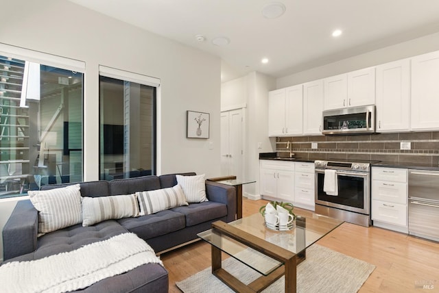 119 Marguerite Ave, Mill Valley, CA 94941 - living room featuring light wood finished floors and recessed lighting