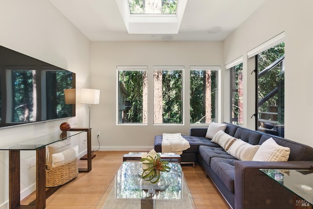 119 Marguerite Ave, Mill Valley, CA 94941 - living area with a skylight, light wood finished floors, and baseboards