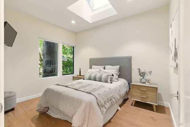 119 Marguerite Ave, Mill Valley, CA 94941 - bedroom with a skylight, light wood-style floors, recessed lighting, and baseboards