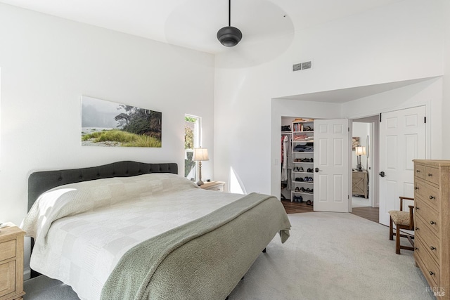 3336 Brittany Cir, Napa, CA 94558 - carpeted bedroom featuring a closet, a towering ceiling, and a walk in closet