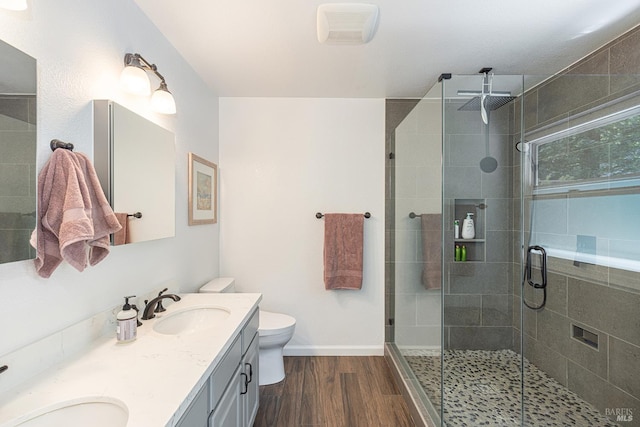3336 Brittany Cir, Napa, CA 94558 - full bath with wood finished floors, a shower stall, toilet, and baseboards