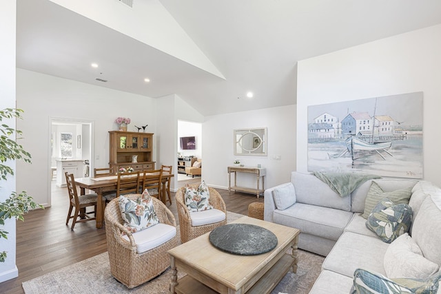 3336 Brittany Cir, Napa, CA 94558 - living room featuring wood finished floors, recessed lighting, high vaulted ceiling, and baseboards
