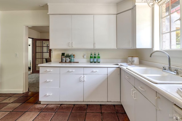 11 Inverness Way S, Inverness, CA 94937 - kitchen featuring a sink, white cabinetry, and light countertops