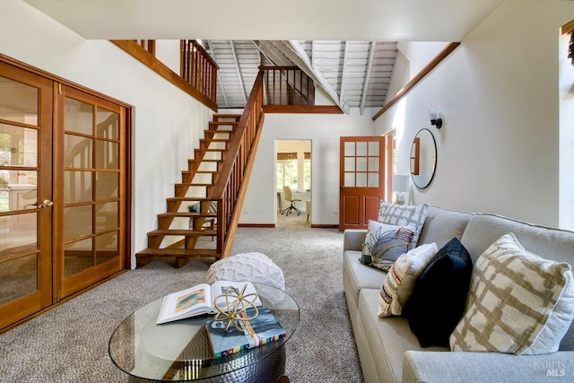 11 Inverness Way S, Inverness, CA 94937 - living area featuring carpet flooring, stairs, baseboards, and french doors