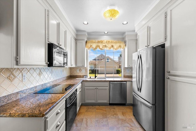 843 Cab Calloway Ct, Windsor, CA 95492 - kitchen with black appliances, a sink, tasteful backsplash, dark countertops, and ornamental molding