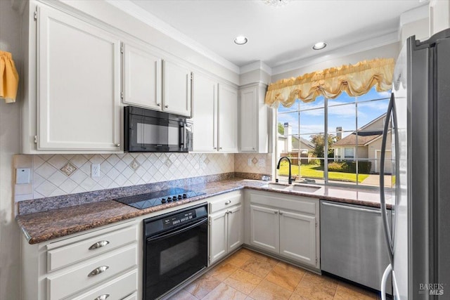 843 Cab Calloway Ct, Windsor, CA 95492 - kitchen featuring black appliances, a sink, decorative backsplash, crown molding, and dark stone counters