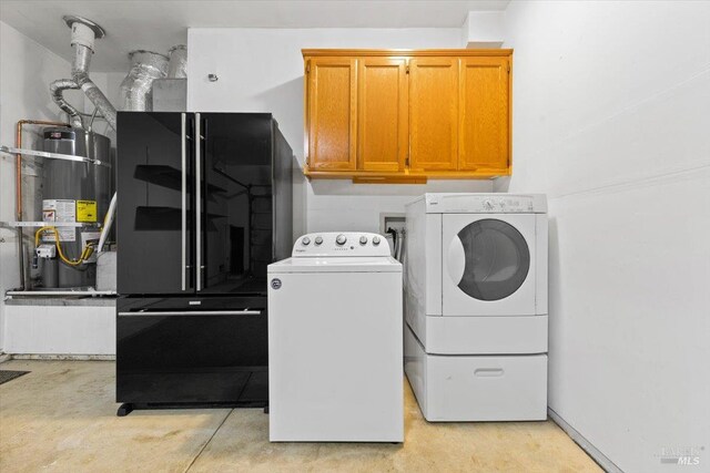 843 Cab Calloway Ct, Windsor, CA 95492 - laundry area featuring strapped water heater, cabinet space, and independent washer and dryer