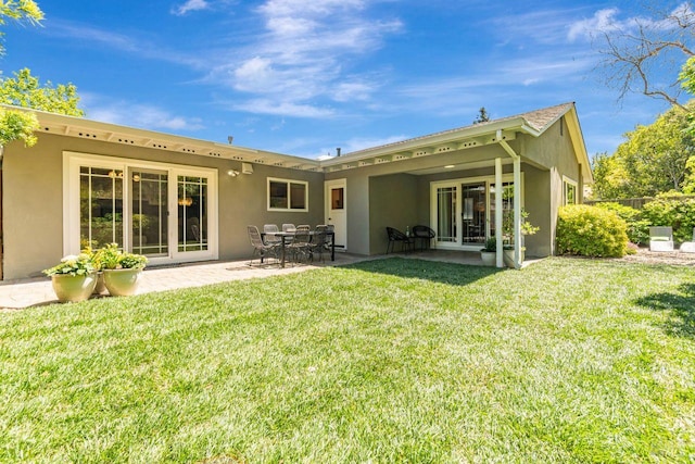 37 Angela Ave, San Anselmo, CA 94960 - back of house featuring stucco siding, a lawn, and a patio area