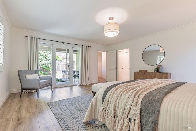 37 Angela Ave, San Anselmo, CA 94960 - bedroom featuring access to exterior, baseboards, light wood-type flooring, ornamental molding, and a closet