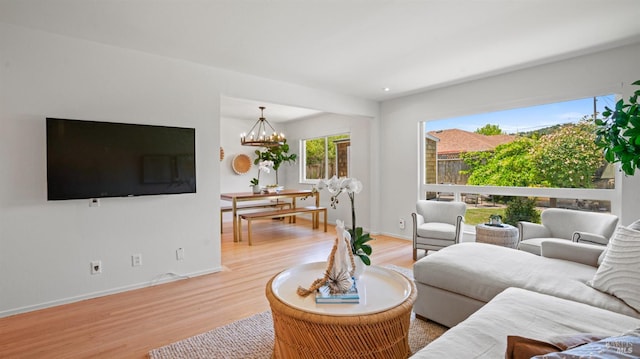 40 Staghound Psge, Corte Madera, CA 94925 - living area with wood finished floors, a chandelier, and baseboards