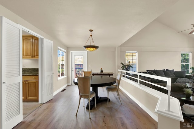3327 Colonial Ct, Fairfield, CA 94534 - dining room featuring light wood finished floors, plenty of natural light, and baseboards