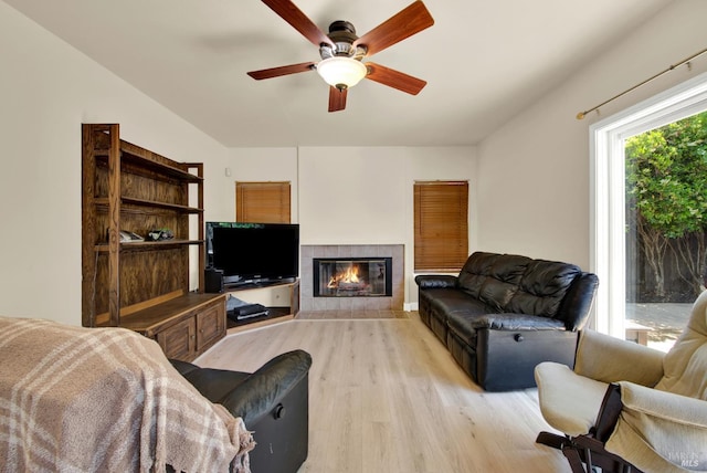 3327 Colonial Ct, Fairfield, CA 94534 - living room with light wood-style floors, ceiling fan, and a tiled fireplace